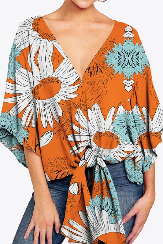 Printed Deep V Tie Hem Blouse Laid - back Women's Vibe